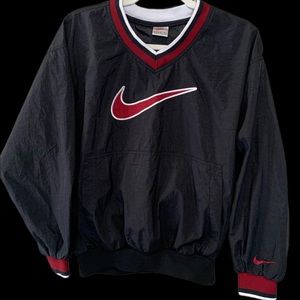 Vintage Nike wind breaker with front pocket. Youth 14/16.